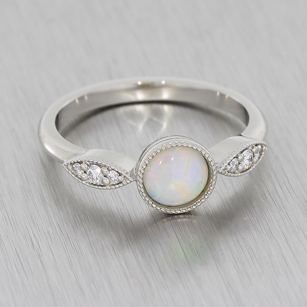 Platinum opal clearance ring